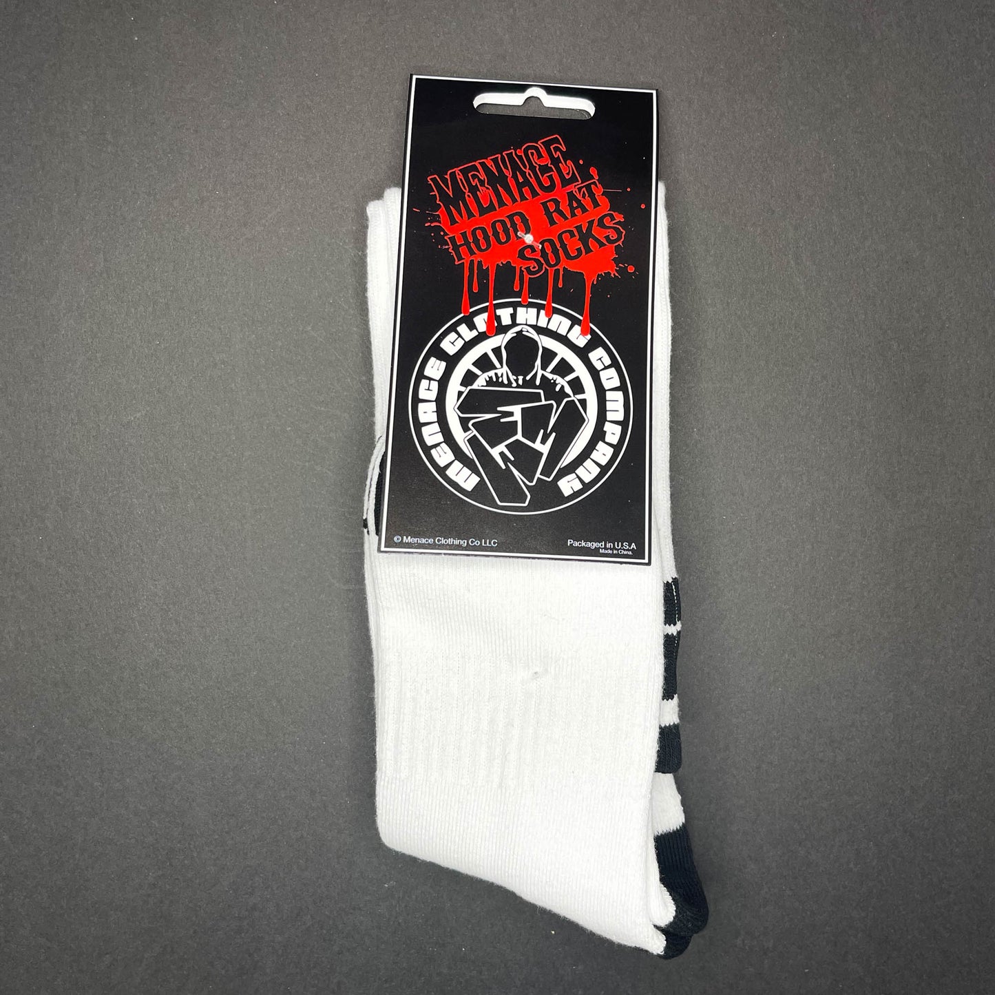 Menace Clothing black and white Hood Rat knee high socks with packaging.
