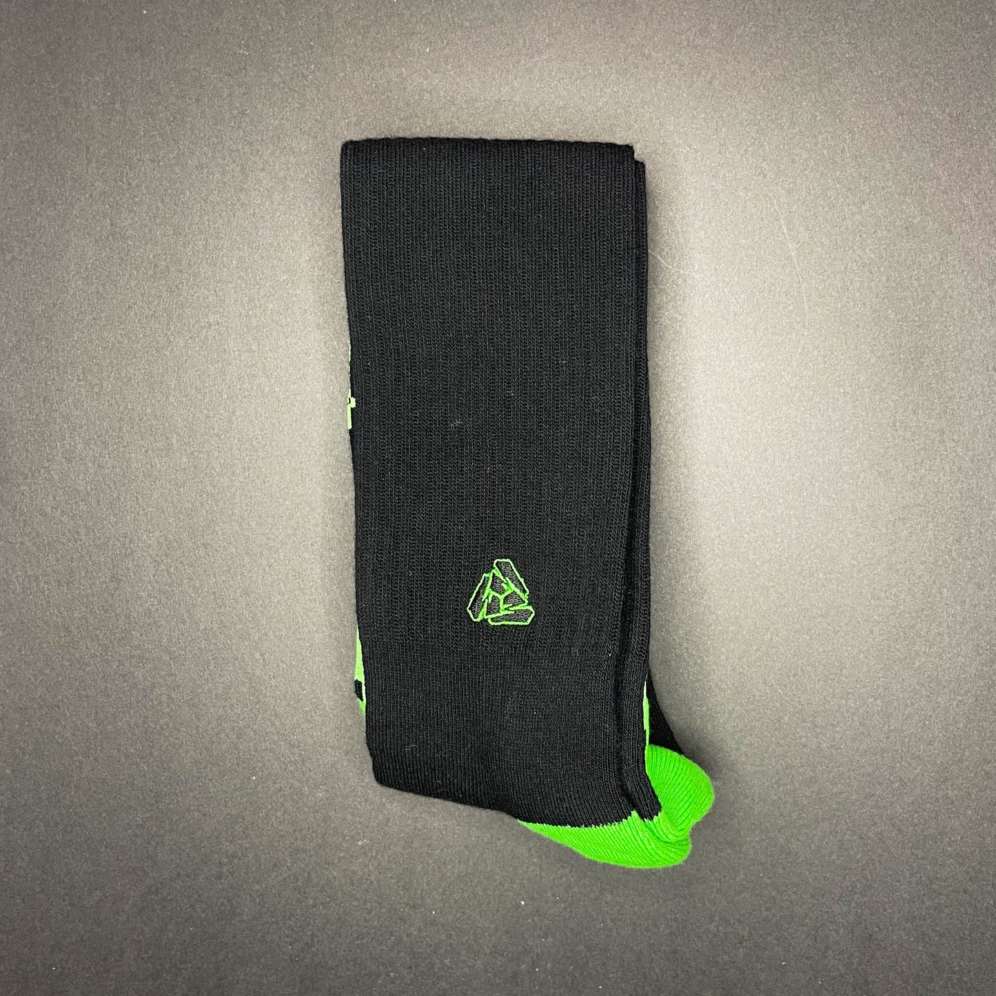 Menace Clothing green and black Hood Rat knee high socks and Menace Tri M logo.