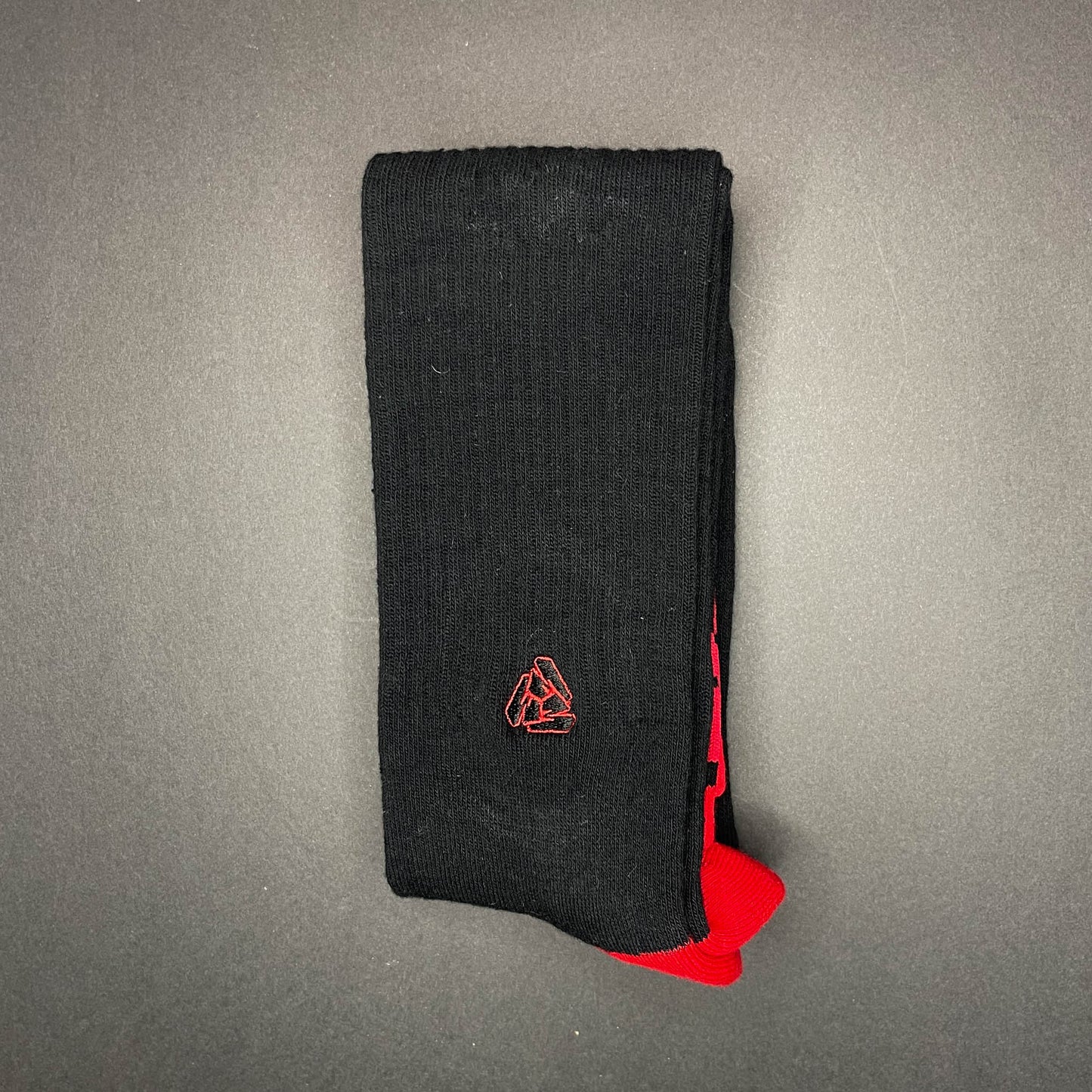 Menace Clothing red and black Hood Rat knee high socks and Menace Tri M logo.