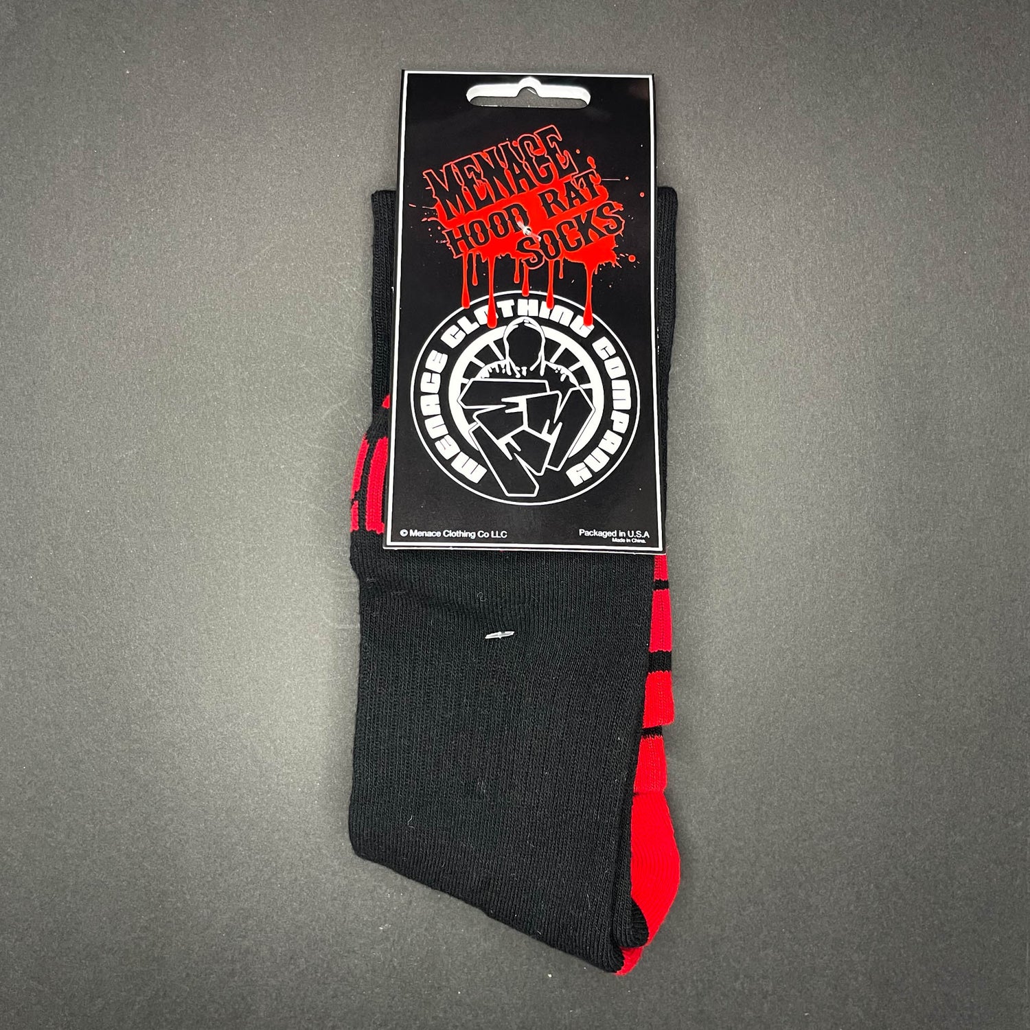 Menace Clothing red and black Hood Rat knee high socks with packaging.