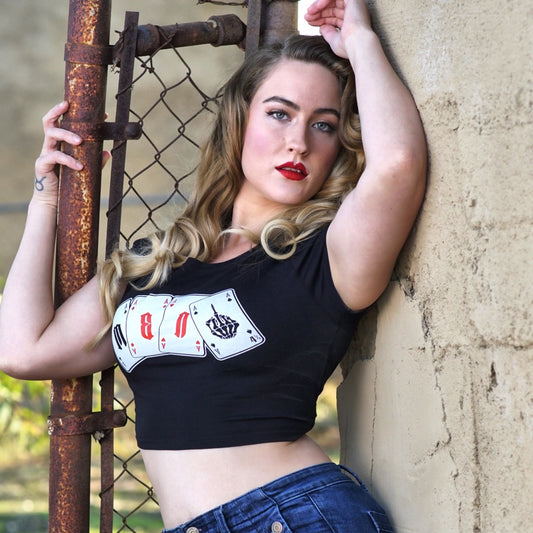 Female in black Menace Clothing Company Ace-Hole Crop Top.