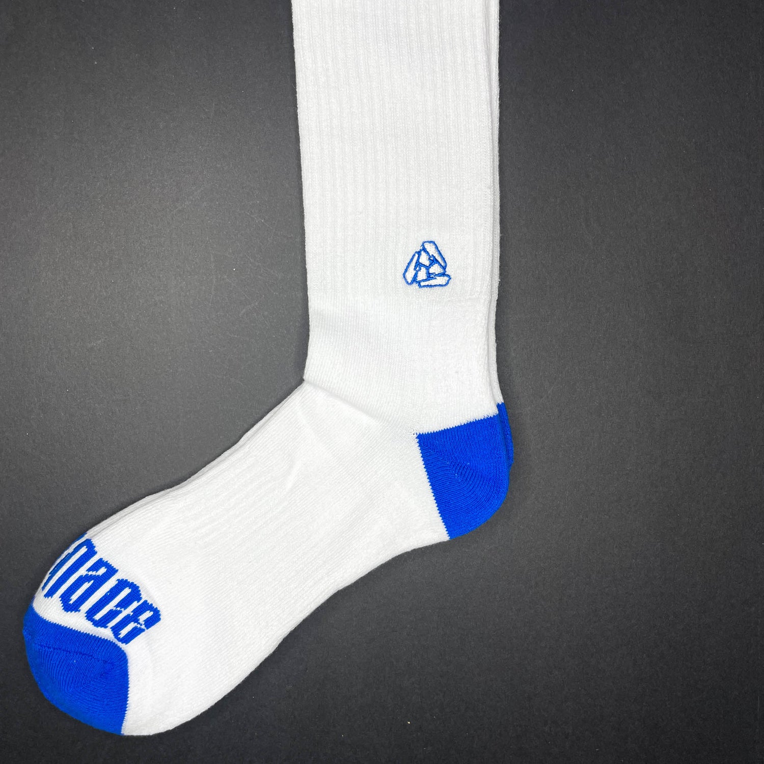 Side view of Menace Clothing Hood Rat blue and white knee high socks with Menace on toes and Tri M logo on side.