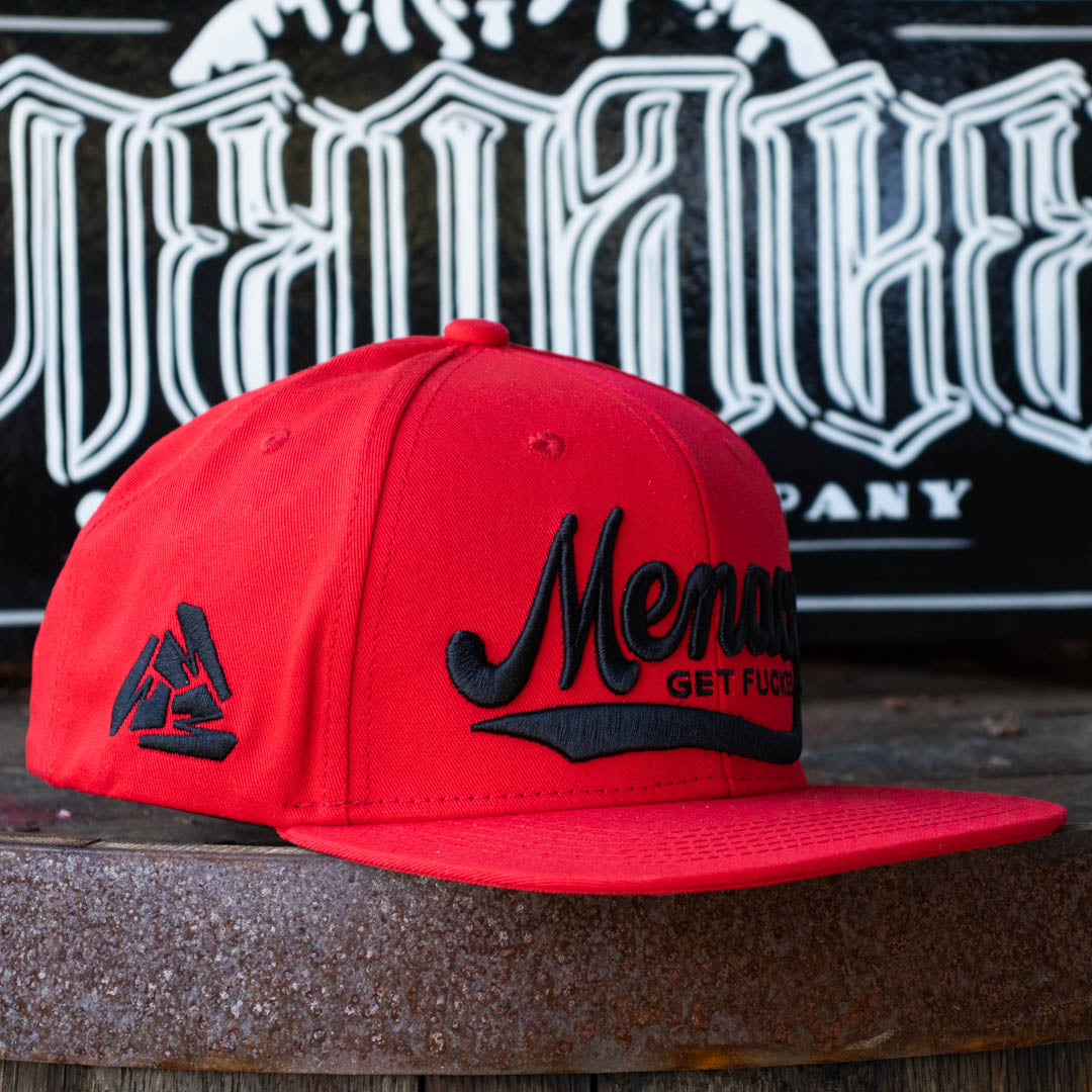 Embroidered right side of Menace Clothing red baseball hat showing Menace Tri M logo and saying Get Fucked.